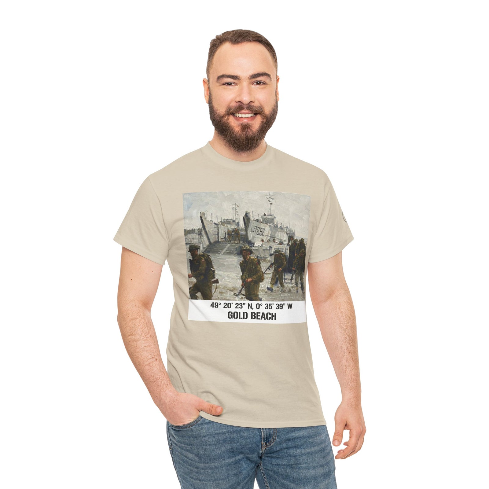 Sand-colored Gold Beach Coordinates T-shirt by Veteran owned, featuring a D-Day Normandy scene graphic, styled with jeans.