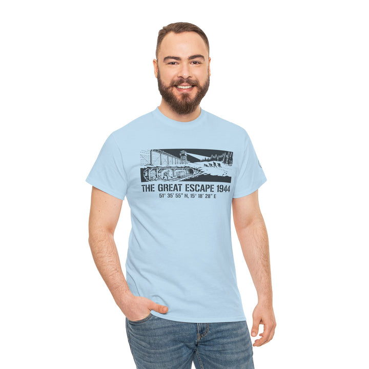 Light blue T-shirt with "The Great Escape 1944" design by S&amp;W Gallus, worn with jeans by a smiling man.