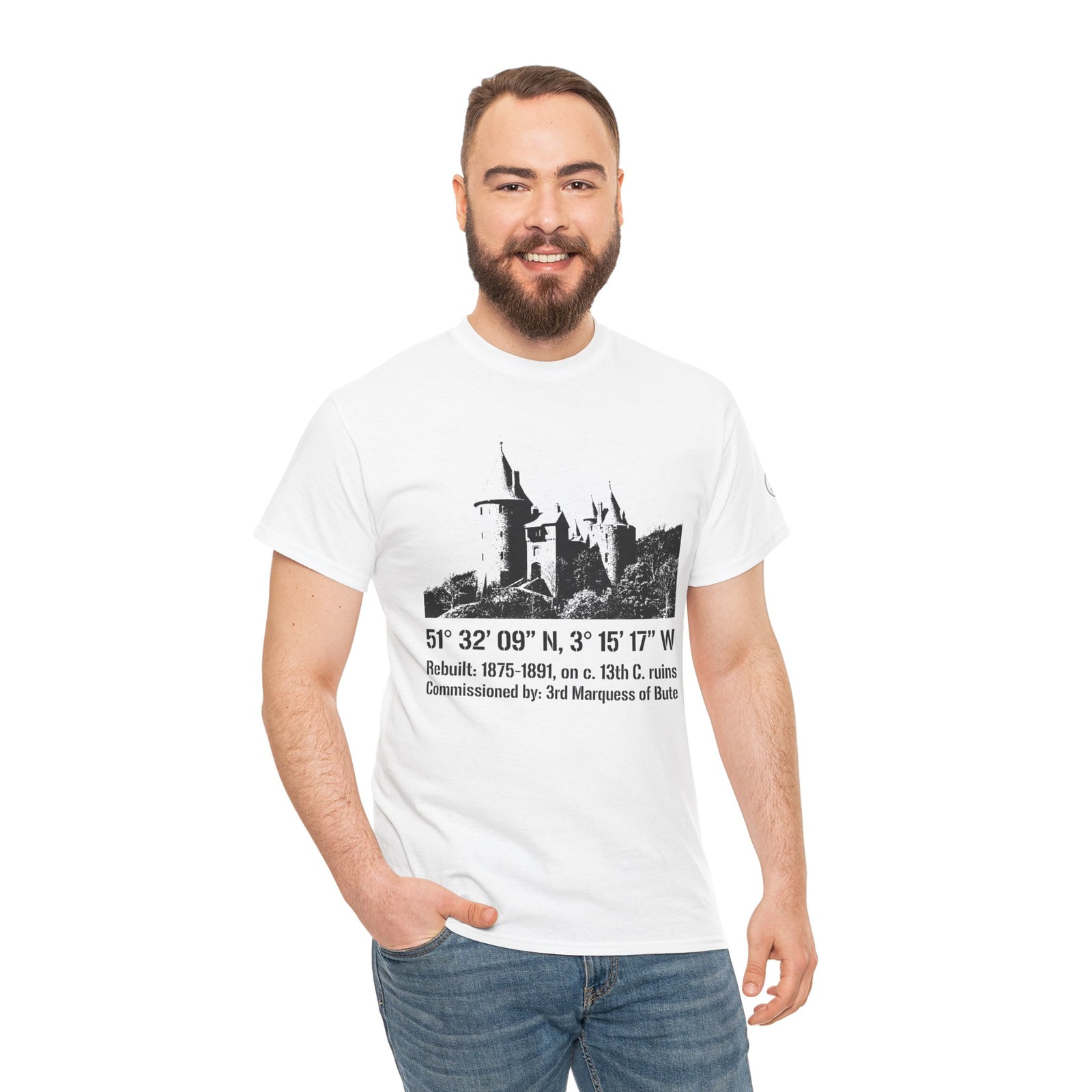 White T-shirt by S&W Gallus featuring a vintage Welsh castle illustration with coordinates and historical details.
