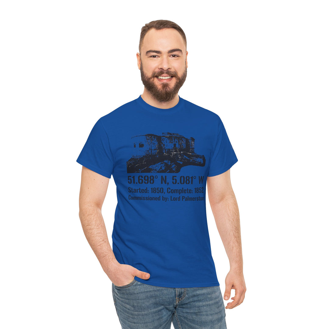 Blue Stack Rock Fort T-shirt by S&amp;W Gallus, featuring a fort image and location coordinates, worn with jeans by a smiling man.

