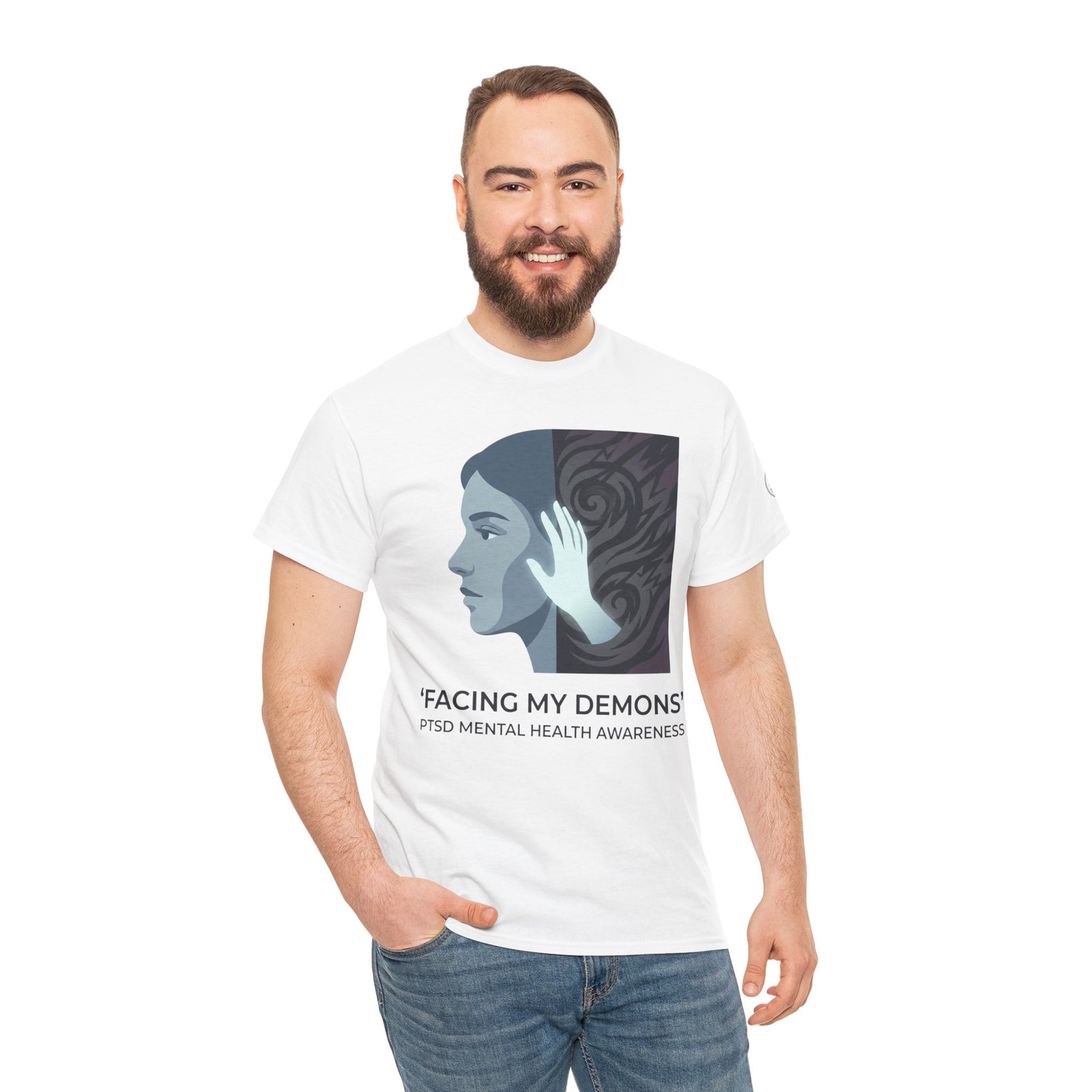 White PTSD awareness t-shirt from Veteran Owned, featuring a face and hand graphic, worn with jeans.