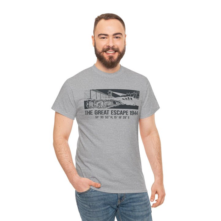 Gray graphic T-shirt with "The Great Escape" design by S&amp;W Gallus, worn with jeans by a smiling man.