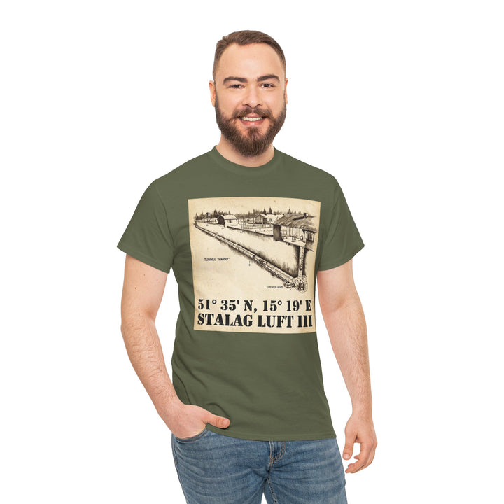 Olive drab t-shirt by Veteran owned featuring a Stalag Luft III graphic, worn with jeans.
